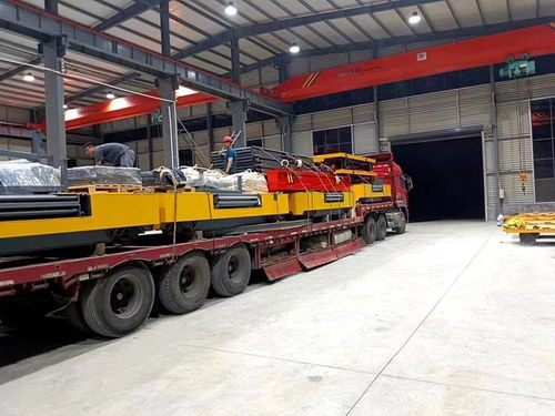 RGV電動(dòng)平車(chē)攜手托輥?zhàn)詣?dòng)裝卸設(shè)備，締造搬運(yùn)高效新紀(jì)元